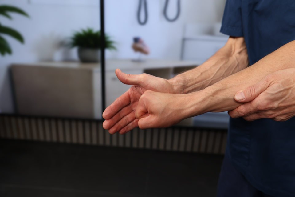 The examiner stabilizes the forearm and tests isometric ulnar deviation of the wrist.